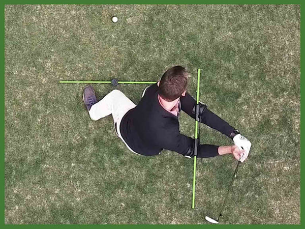 Top down Swing Align alignment rods in action golf shot