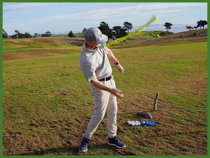 Tuck the Swing Align Whip's grip under your arm and learn to use your body to drive your golf swing
